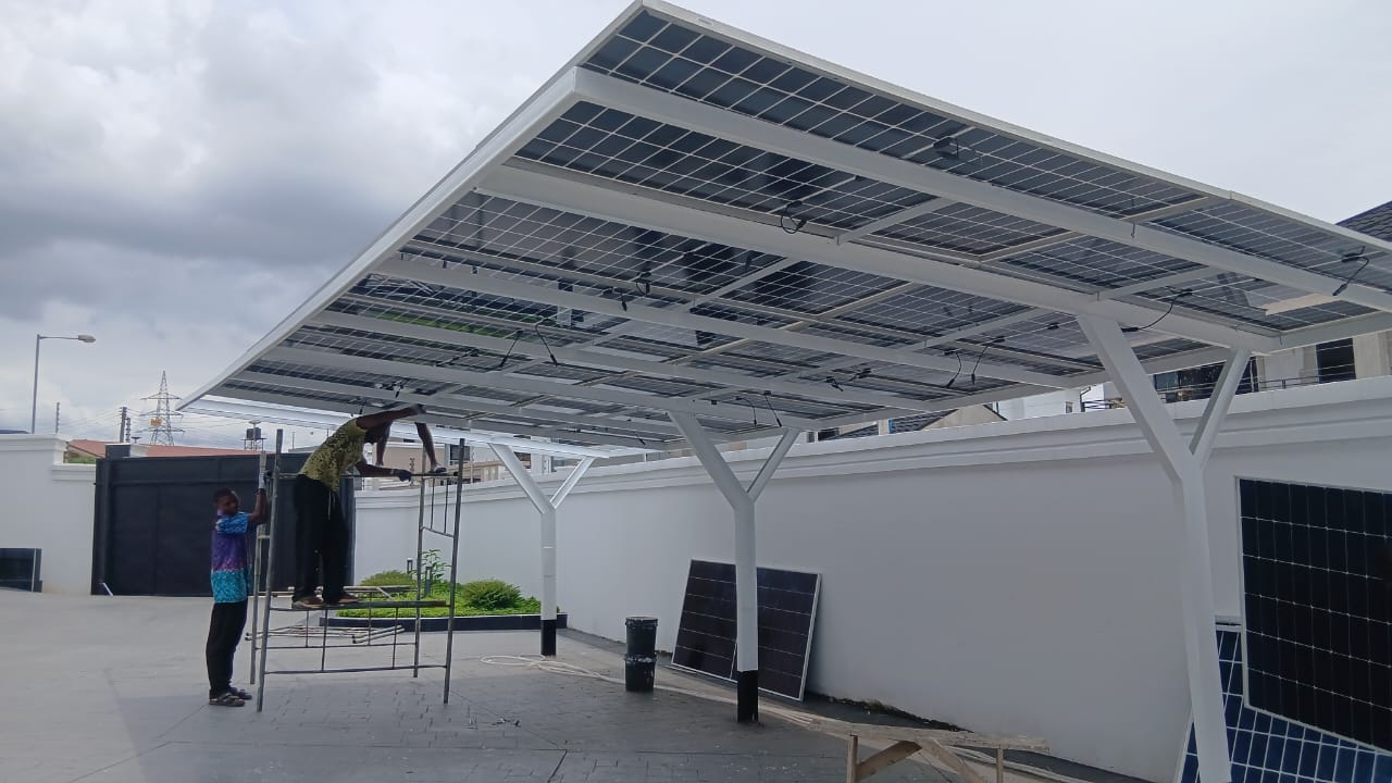 Solar carport being installed by POWERSOURCE technicians
